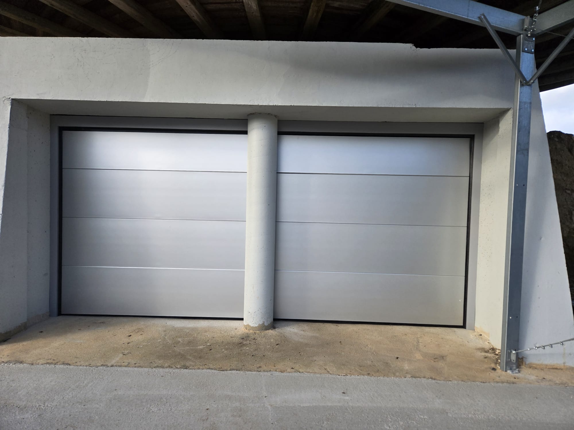 Porte de garage sectionnelle a Scaer